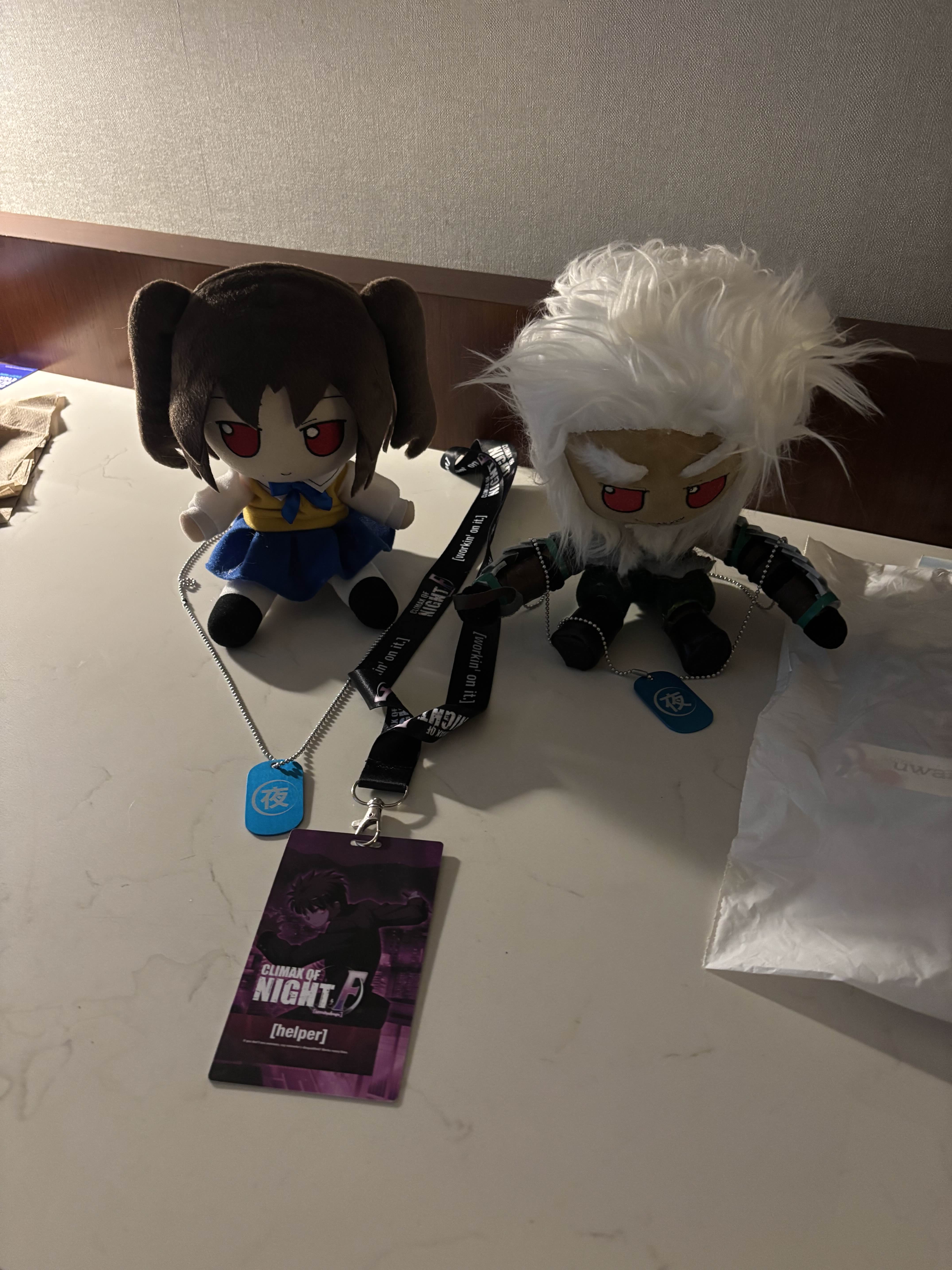 custom fumos of Satsuki Yumizuka and Waldstein wearing dog tags obtained by participating in main game pools at Climax of Night 7.